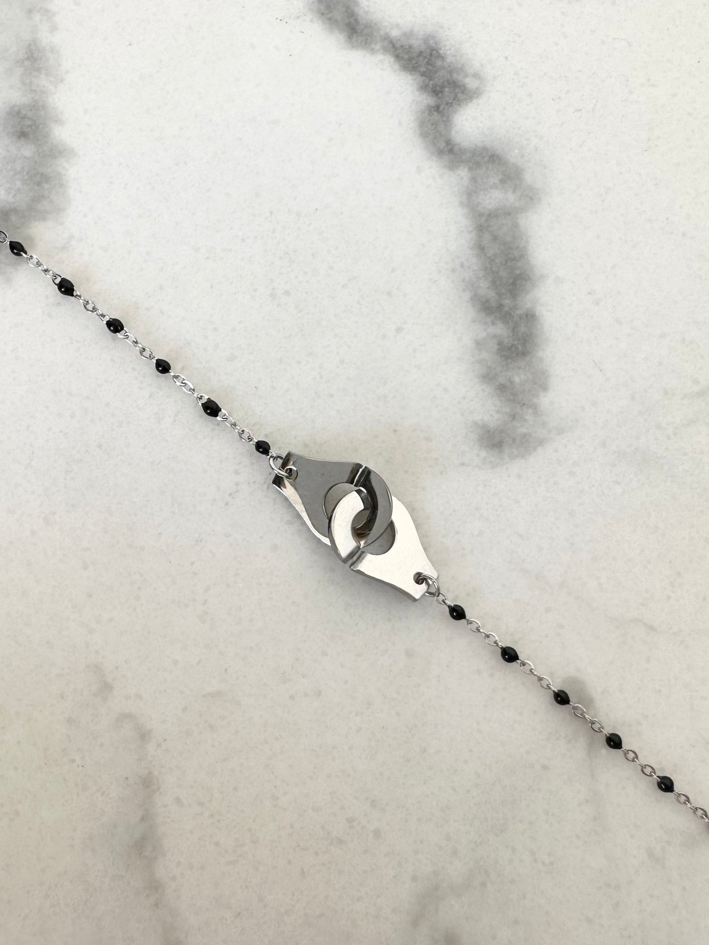 Bracelet Menottes noir et argenté